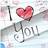 Pixelated image showing 'I' followed by a red heart symbol and the word 'you' in stylized script on a light background.