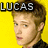 Pixelated image of a person with light brown hair against bright yellow background, text "LUCAS" in blocky white letters above head.