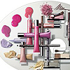 A static composition of cosmetic products including tubes, brushes, and swatches arranged on a light gray background.