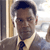 Static 50x50 pixel icon showing a man in business attire with dark hair, light skin tone, and neutral expression against an indistinct background.