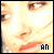 four pixelated facial close-ups with text variations in the bottom-right corner, showing subtle changes in facial expression and text characters