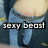 Pixelated image of a person in blue jeans and light-colored top with text 'sexy beast' overlaid.