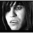 Black-and-white pixelated portrait of a person with shoulder-length hair, red text reading 'You have to luv him' and 'Pete Went', and '<3' symbol on black background.