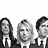 Animated contact sheet of 18 frames showing a black-and-white portrait sequence with yellow and white text overlays for "NIRVANA" and "With The Lights Out" on a dark background.