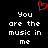 Black background with white pixelated text reading 'You are the music in me' and a red pixelated heart symbol above the text.