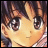 Anime-style character face with brown hair and large eyes, next to pixelated text on black background.