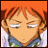 A 48x48 pixel animated buddy icon featuring a close-up of an anime character with orange hair and closed eyes on the left, paired with stylized text reading "Anime IM" and "com" on a black background to the right.