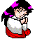 Pixelated character with black hair and pink accents wears white top and red skirt, arms crossed in front of chest against blue or gray background.