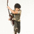 A pixelated figure in a dark outfit holds a long pole, with arms raised and body slightly turned left.