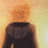 Pixelated figure with orange hair and dark clothing against a gradient background of yellow to light brown.