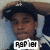 Pixelated image of a person wearing a dark hat with a light band, light-colored shirt, and dark jacket, with text reading "Rafael" at the bottom.