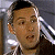 A split-frame contact sheet showing a pixelated character on the left and green text on a dark background on the right, both from an animated AIM buddy icon.