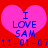 Two pink hearts on red background with blue text "I LOVE SAM" and date string below.