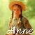 A pixelated image of a person in a straw hat and long dress with text reading 'Anne' at the bottom left, 'with' at the top right, 'an' at the bottom center, and ''E'' at the bottom right.