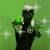 Green-skinned figure with white hair holds glowing green orb, surrounded by white starbursts on green background, with one showing gray background