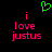 Green pixelated heart above pink text 'i love justus' on black background, with two identical static frames.