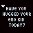 Pixelated text 'HAVE YOU HUGGED YOUR EMO KID TODAY?' in light blue on black background with small white hearts scattered across the