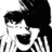 Black-and-white pixelated image of a person with dark hair, wearing striped clothing and holding hands near the face in multiple views.