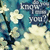 A static image of a blue background with white cherry blossoms and dark branches, overlaid with repeated text "Do you know I miss YOU?" in varying fonts.