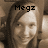 A pixelated image of a person with long hair smiling, overlaid with text labels in different positions.