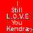 Red background with white text reading "I Still L.O.V.E You Kendra" in three , some frames showing a heart symbol replacing the question mark