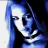 Pixelated image of a person with blue hair and white face against black background, next to pixelated text reading ALIAS in blocky font.