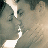 A pixelated image split into two sections: a close-up of two people kissing on the left and text reading "You AND me" in stylized fonts on the right.