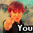 A person with reddish-brown hair points forward in a of six , each displaying partial text forming 'You Can Bet On Me' against a blurred background