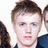 Pixelated image of a person with light brown hair and blue eyes, next to pink text reading 'WILL PUGH' on a black background.