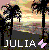 Pixelated beach scene with silhouetted trees, sunset sky, and water reflection beneath the name 'JULIA' in white block letters.