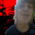 A four- with red and gray backgrounds, featuring pixelated text and a blurred figure in the top-left