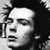 A 50x50 pixel animated contact sheet showing two frames of a Sex Pistols-themed buddy icon with black-and-white portrait and red/black text elements.
