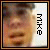 A pixelated image of a person's face with two vertical text blocks on the right side, one reading 'FAM' and the other reversed as 'MIXED'.