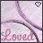 Two side-by-side pixelated images of a light purple background with a curved dark gray line and pink cursive text reading "Loved" at the bottom, differing only in the heart symbol's color.