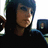 Pixelated static image of a person with dark hair and a dark top, partially cropped on the left and right edges.
