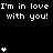 Pixel art displays repeated text "I'm in love with you!" and heart symbols on a black background, with one gray rectangle visible at the bottom right.