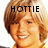 Pixelated image of a smiling person with light brown hair, overlaid text 'HOTTIE' in bold black letters.