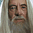 Four- shows a pixelated face with long white hair and beard, golden text reading "Lord of the Rings" , and black background with gold lettering