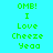Pixelated green text on cyan background with pink highlight boxes, displaying 'OMB! I Love Cheeze Yea' in a