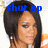 A pixelated image of a person with long dark hair wearing an orange and white striped top, overlaid with blue text reading "shut up" on the left side.