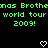 Green pixelated text on black background reads 'nas Brothenas Brothe world tour world tour 2009! 2009!' with two white heart symbols at bottom.