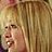 Six- of pixelated images showing a blonde woman and an older man in various poses with text reading 'Cheaper By the Dozen' on the right