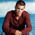 A pixelated image of a person in a maroon long-sleeve shirt against a blue background, with green text reading "MY SEX HOTTE" on red