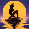 Silhouette of a seated figure on a rock at water's edge under a large yellow moon, with reflection in rippling water.