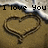 Two side-by-side pixelated beach scenes with heart-shaped sand drawings, each containing distinct text overlays.