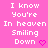 Pixelated text on a pink background with two identical phrases and heart symbols.