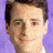 A 48x48 pixel buddy icon featuring a split composition with a person's face on the left and green text on a dark background on the right, displayed as part of an animated contact sheet.