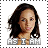 Pixelated portrait of a person with long dark hair and light skin, wearing a strapless top, with text below reading "ASIAN" in block letters.