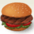 Pixelated image of a hamburger with sesame seed bun, brown patty, green lettuce, and red tomato slice on white background.