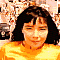 pixelated frames showing a person in a yellow shirt performing sequential hand-to-mouth gestures against a blurred background